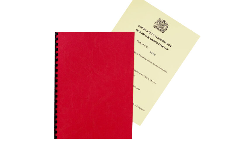 Indian entrepreneur preparing documents required to register a UK company from India.