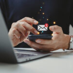 Indian business owner using a UK phone number to communicate with UK customers