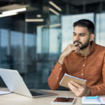 Indian entrepreneur communicating professionally with UK customers while operating from India
